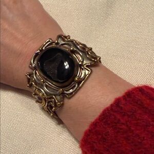 Goldstone/silvertone cuff bracelet with natural stone